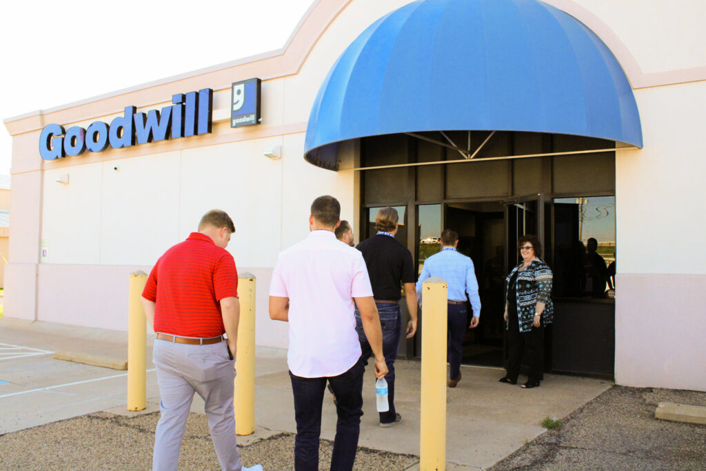 United Way Volunteers Walking Into Goodwill